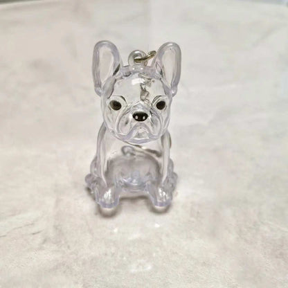 Pet hair keychain with transparent dog-shaped memory capsule
