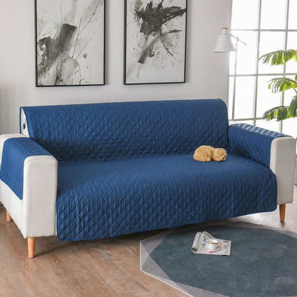 Waterproof couch cover protecting sofa from dog