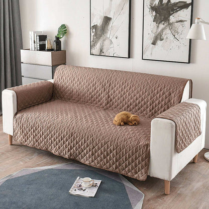 Waterproof couch cover protecting sofa from dog fur and stains
