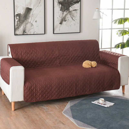 Waterproof couch cover protecting sofa from dog messes