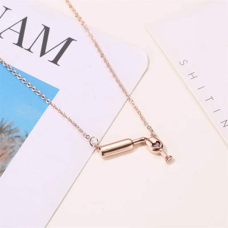 Wine bottle necklace with red zircon crystal pendant on adjustable copper chain